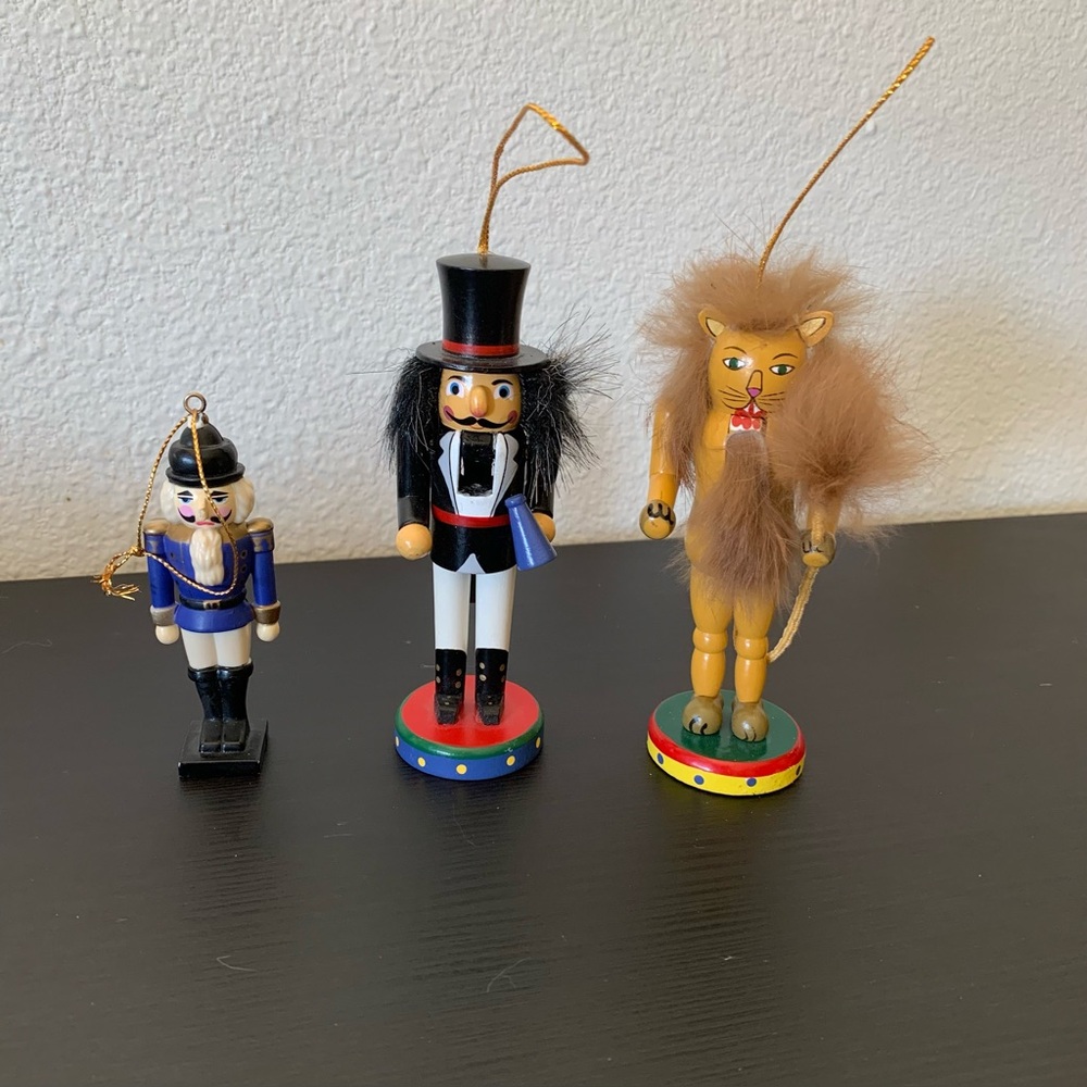 2 vintage nutcracker village circus nutcrackers and 1 plastic soldier